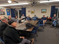Members of Chapter 54's Board of Directors discuss the results of the all-chapter survey during a meeting on May 6, 2024