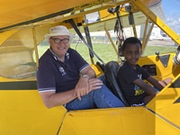 The cub pilot in a Cub airplane
