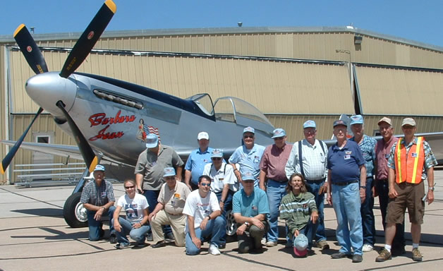 EAA Chapter 1091 in front of a WWII Mustang