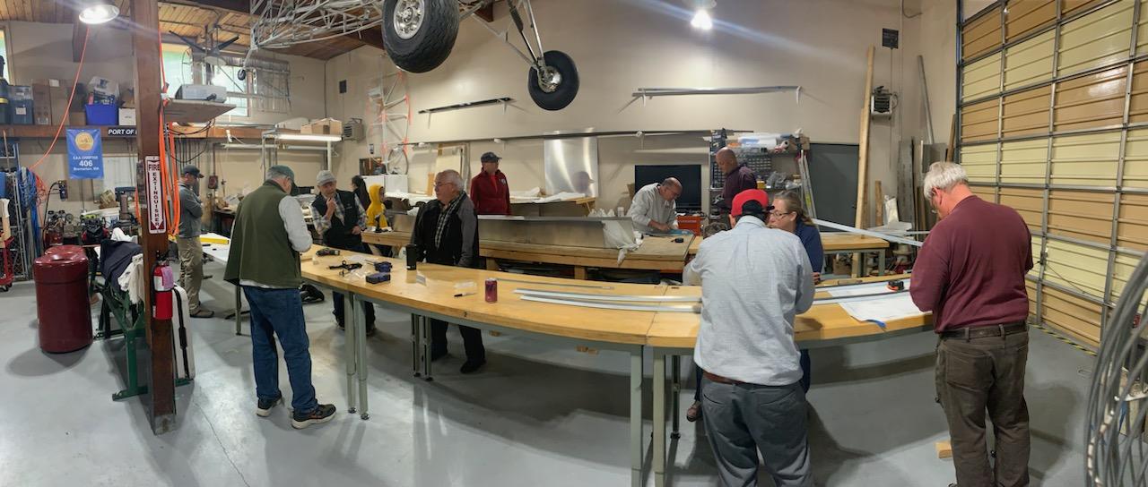 BACE team building a long table for wing assembly