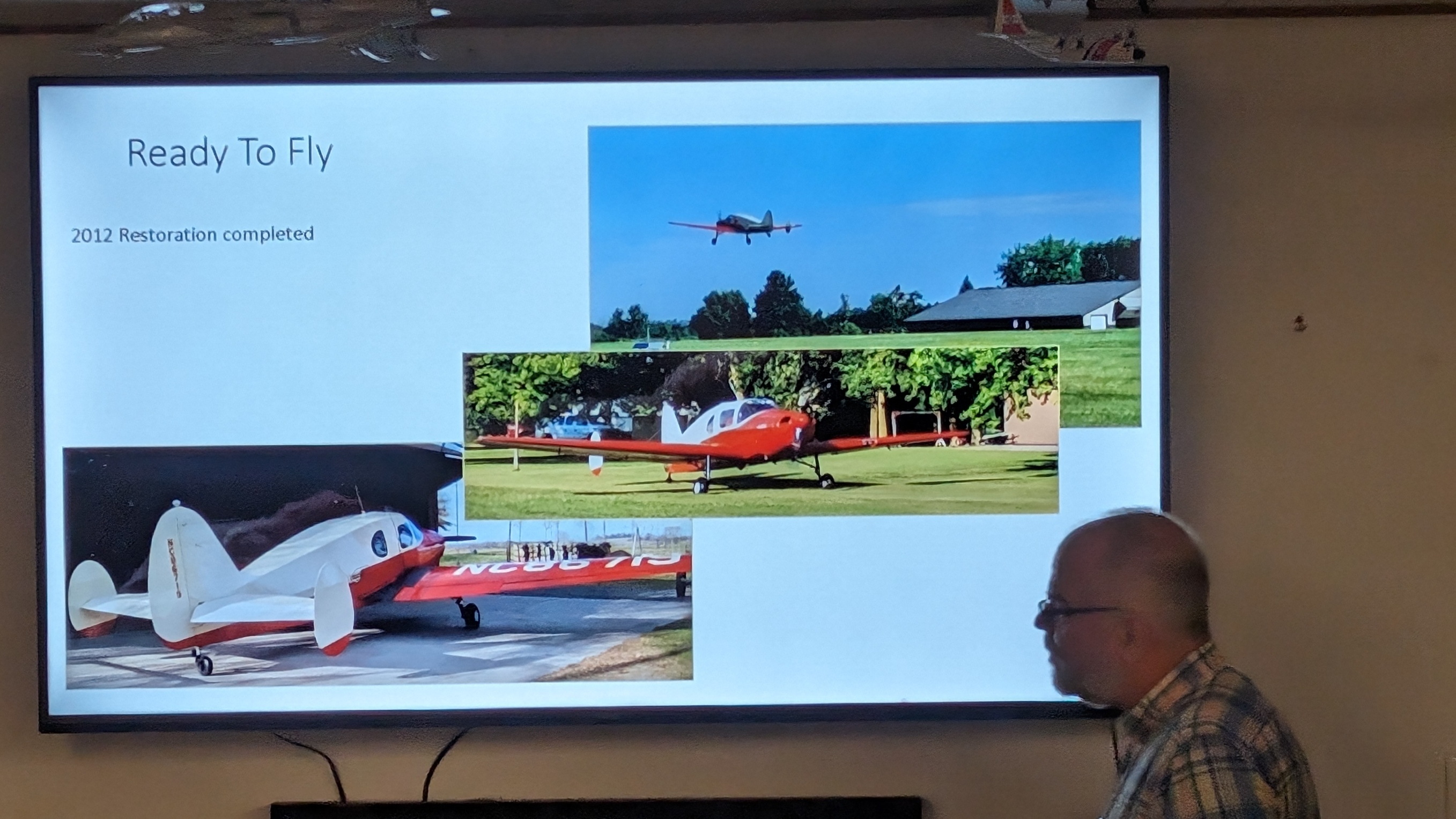 Harry Holmberg discusses his Bellanca restoration during the November 2023 meeting at Chapter 54 .