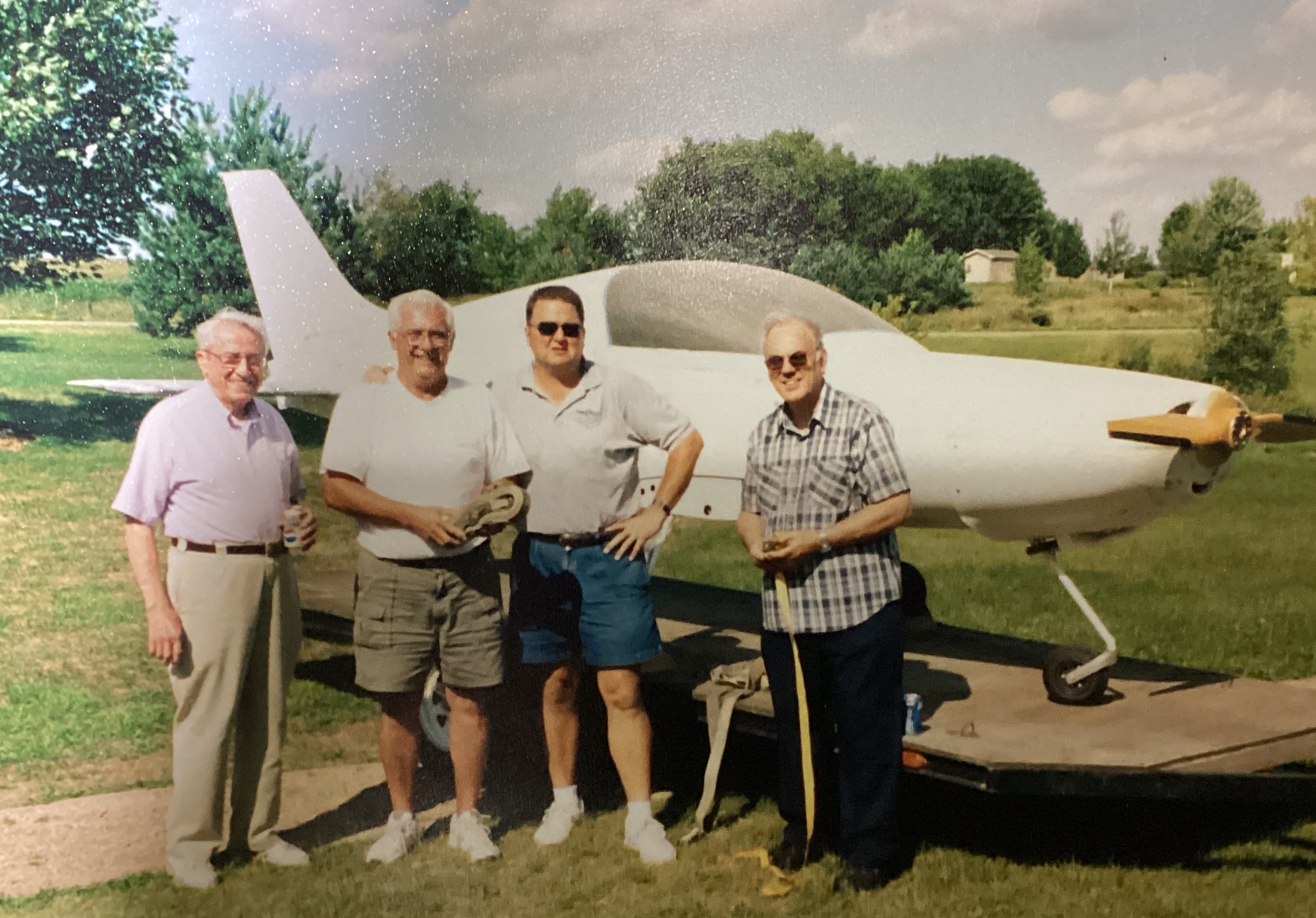 Art Edhlund, Paul Hove, and Tom Gibbons moving a Pulsar