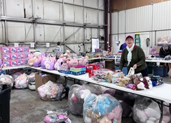 Tree of Hope volunteers sort toys