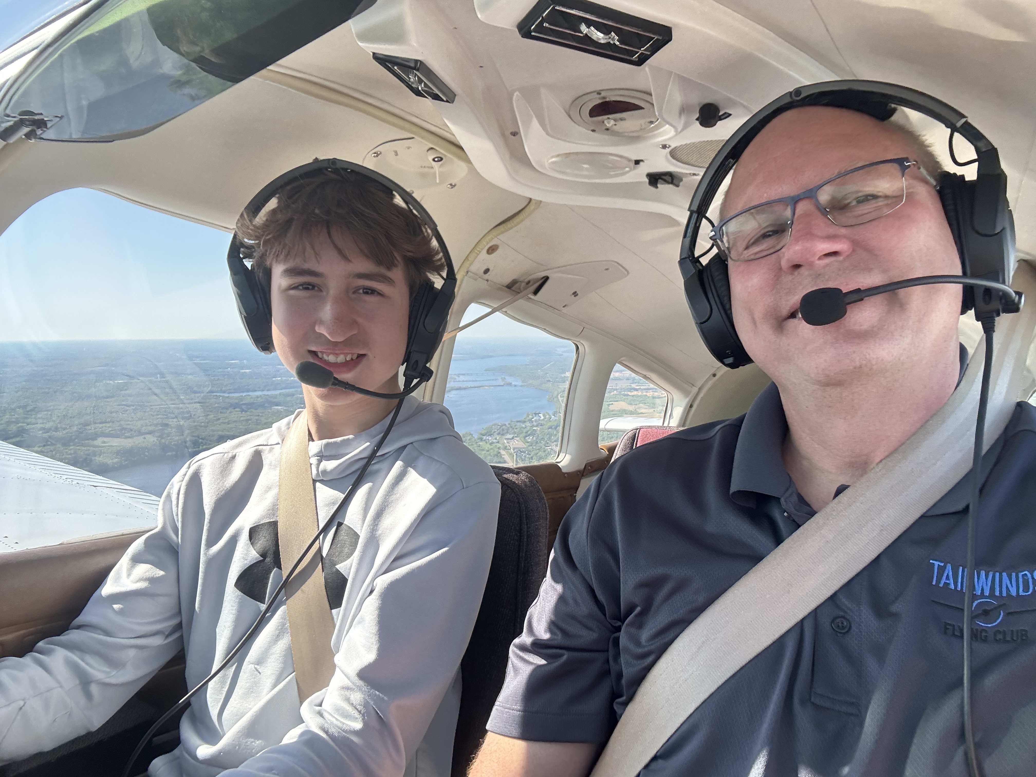 Pilot Scott Hanson with a Young Eagle at the controls